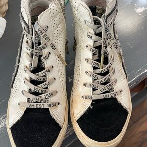 Vintage hi top shoe.